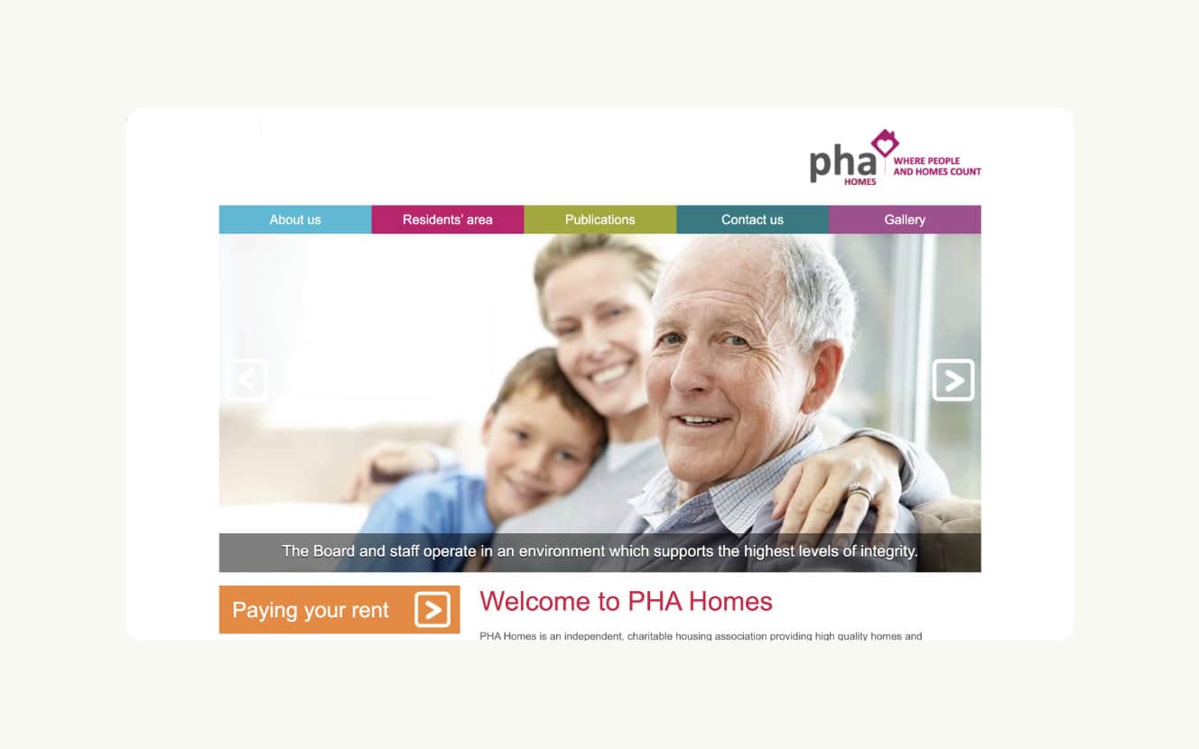 An elderly man sits and smiles with a young boy and woman, accompanied by the text, "Welcome to PHA Homes" and navigation tabs at the top of the webpage. | Rubber Duckers