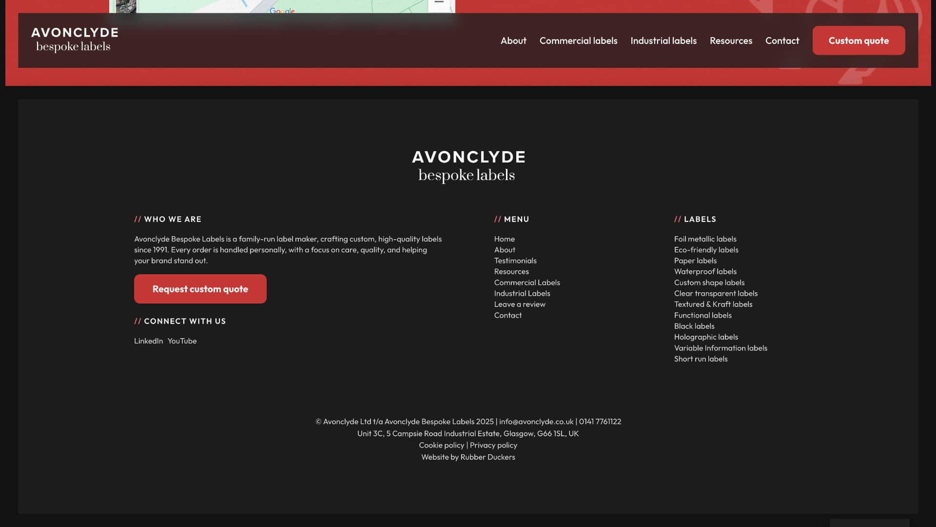 Screenshot of the AvonClyde website footer displaying navigation menus, contact details, social links, and sections for company info and bespoke labels categories. | Rubber Duckers