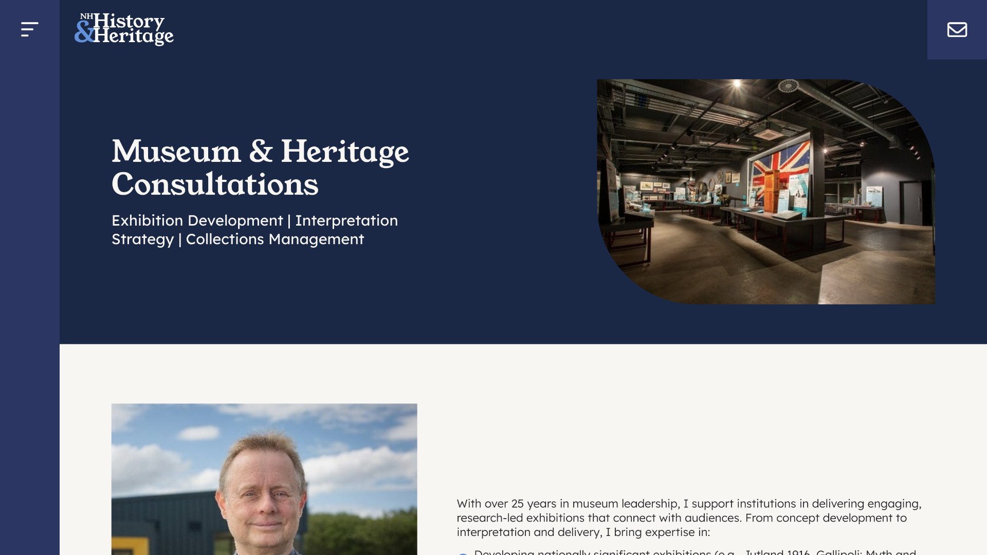A museum exhibit space featuring display cases, artifacts, and a large British flag, with text about heritage and history consultations by Nick Hewitt on the left. | Rubber Duckers